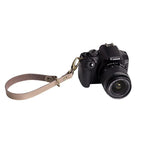 The Hantler Wrist strap Taupe / Brass